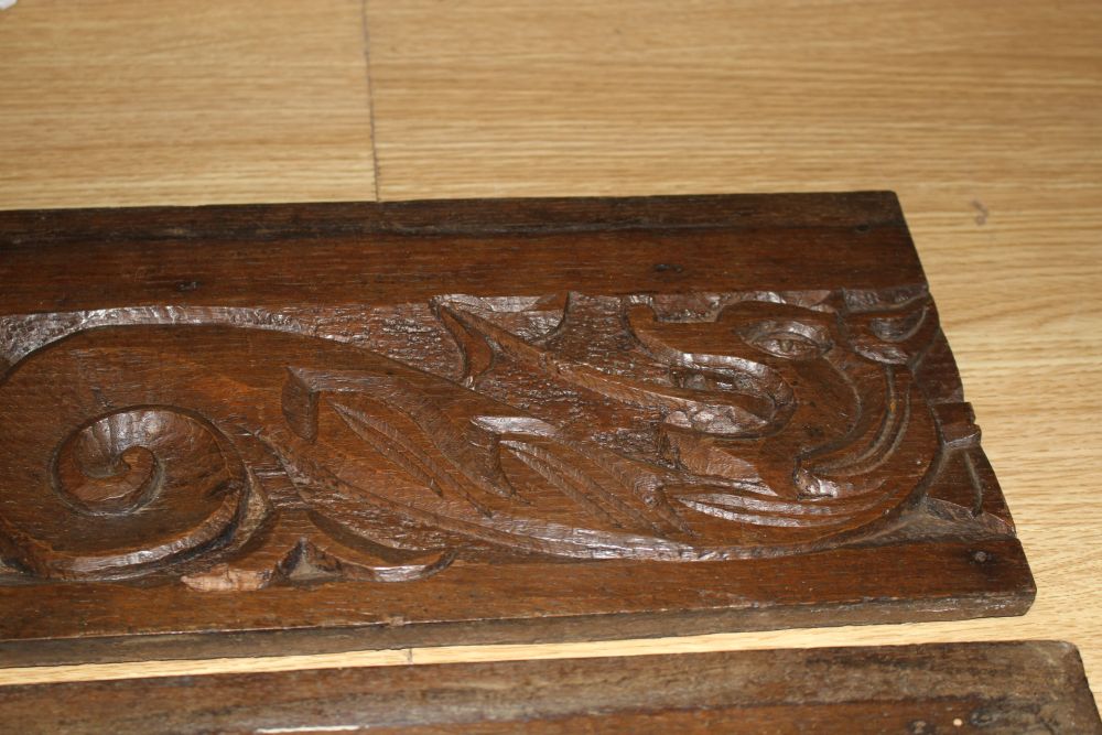 Three 19th century Continental carved oak corbels, carved with lion masks and a pair of scroll and dragon carved frieze panels